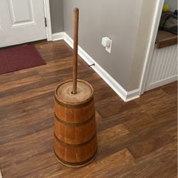 Wood Butter Churn with stamper. The churn is metal banded with a wooden dasher lid and pole. 