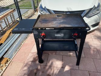 Plancha para la venta costo 250 solo 3 usos la doy por 125 dollars