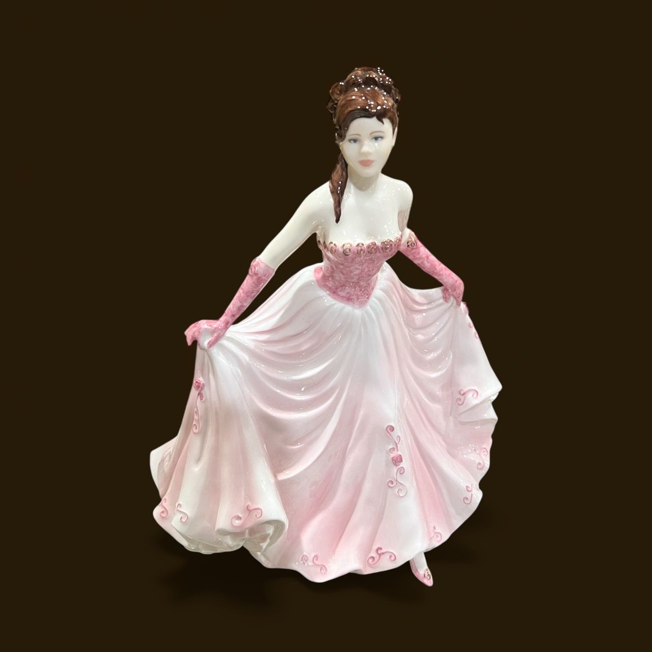 A COALPORT FIGURINE 'HAPPY BIRTHDAY' BY JACK GLYNN