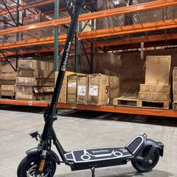Electric scooter with shock absorption