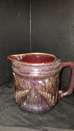 Antique brown glaze stoneware pitcher