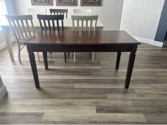Desk, file cabinet and chair