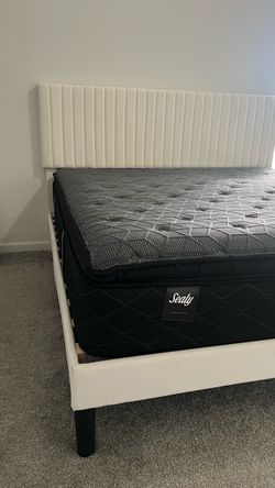 Sealy Mattress with White Upholstered Bed Frame