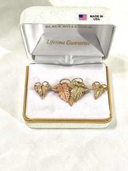 Vintage great condition Black Hills, gold earrings, and matching pin. Weighs 3.8 grams