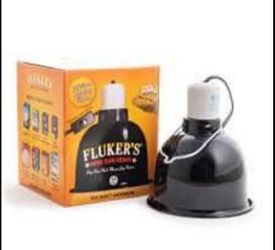 Brand new, never opened Fluker Mini Sun Dome light for reptile tank.