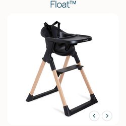 munckin high chair new in box