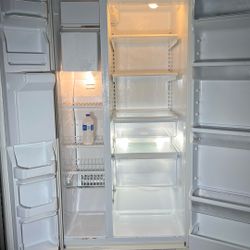 Beige Whirlpool Refrigerator Side-By-Side