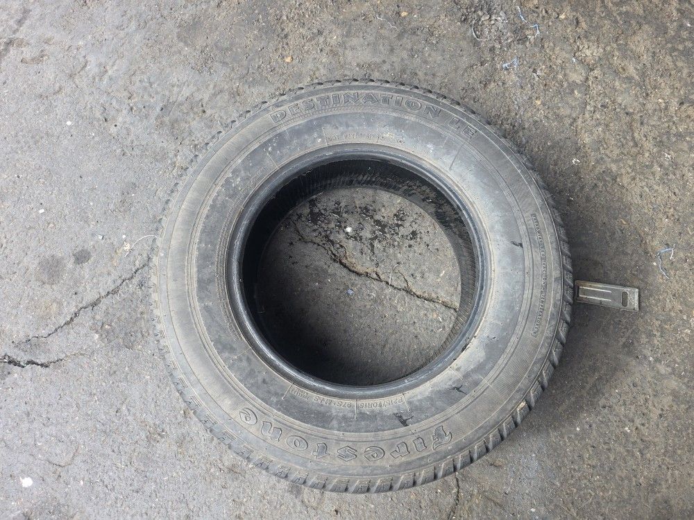 1 use tire 215/70r15 Firestone 97% good