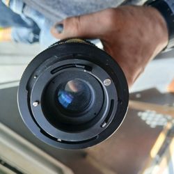 Super Gemini MC Auto Zoom 80-205mm f/4.5 camera lens. 
