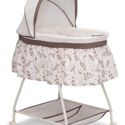Delta Children Deluxe Sweet Beginnings Bedside Bassinet - Portable Crib With Lights And Sounds, Falling Leaves Falling Leaves Bassinet  Open box item 