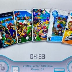 NINTENDO WII with 150 WII and GameCube Games Included