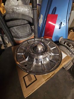 1957 cadillac hubcaps bomb lowrider