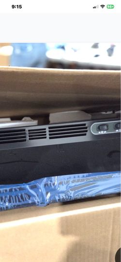 Black Electronics Device with Vents and Controls