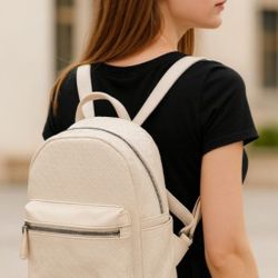 New Mini Backpacks Stylish In Black Or Tan Colors.  $15 Each