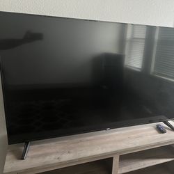 65 inch ONN ROKU SMART TV & TV stand