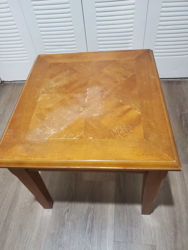 Wood corner table (location  Swartz Creek)