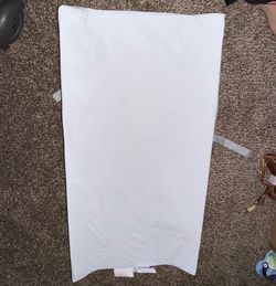 Baby changing pad free with purchase