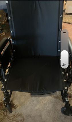 Black Manual Wheelchair with Cushioned Seat
