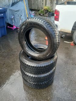  Studded, Snow tires. Size shows on tire.