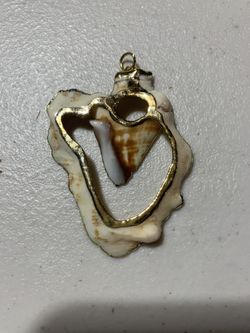 Shell Pendant Trimmed In Gold