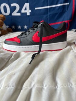 Red and black Nike shoes size 4 and a half