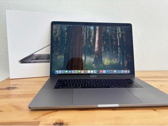 Like New In Box  2019 15-inch MacBook Pro 2.6 i7 | 256GB SSD | 16GB RAM with touch bar and Touch ID.