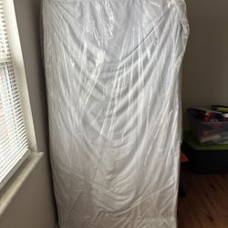 Twin mattress w/ cover