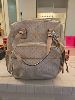 Guess pañalera unisex