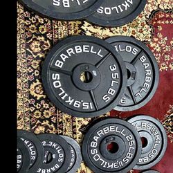 Like new set of 275 Lbs Olympic weights plates