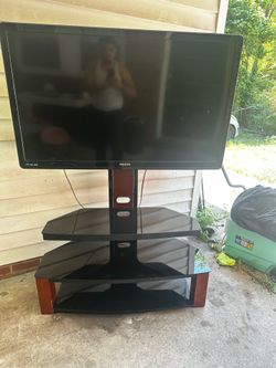 Phillips 50 in flat screen TV with entertain center TV stand included