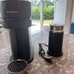 Nespresso virtuoso Coffee Maker   with froth machine. 