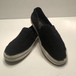 Women’s UGG Black And White Slip-Ons Size 8