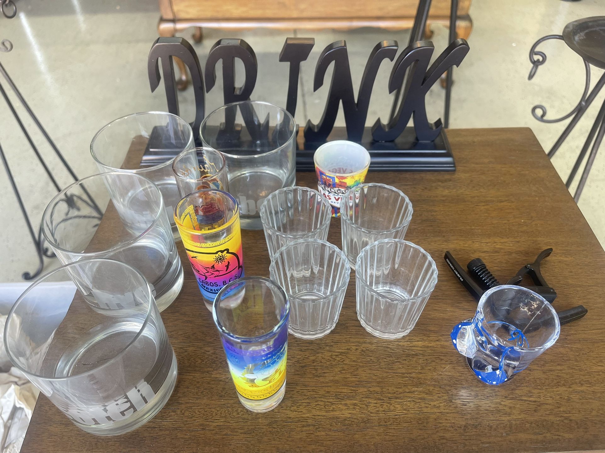 souvenir shot glasses and Drink Sign