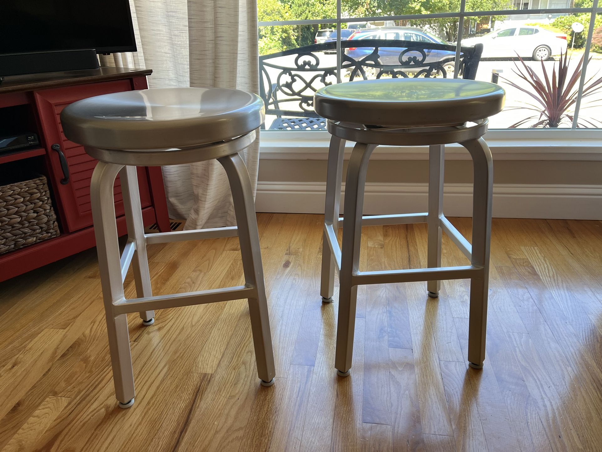 Two Metal Swivel Stools