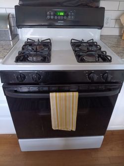 Whirlpools Refrigerator & Microwave , Hotpoint Stove, GE Triton XL Dishwasher