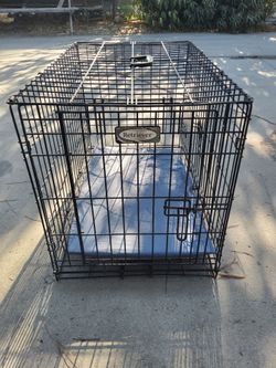Metal heavy duty dog crate 30 l x 21.5 w x 18.5 h. With 2 doors
