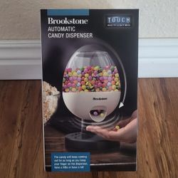 Brookstone Automatic Candy Dispenser - Touch Activated Battery Operated New ( Price Firm).