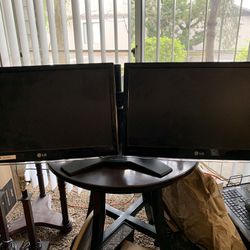 Dual LG LCD HD Monitors With dual Stand. 