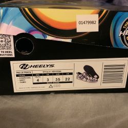Gray Heelys (US: Size 4) BUY: MEET UP