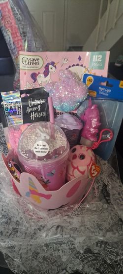 2 unicorn baskets both different