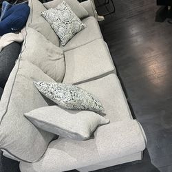 Grey Couch And Chair Plus Pillows