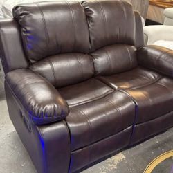 Brown Leather Reclining Sofa and Loveseat with LED Lights.