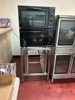 2 commercial MOFFAT turbo fan ovens and stand with the speed rack
