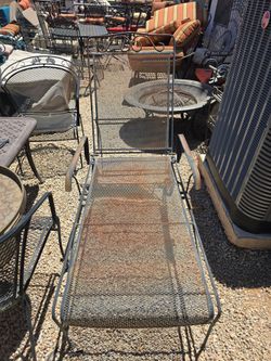 $150 IRON LOUNGE CHAIR