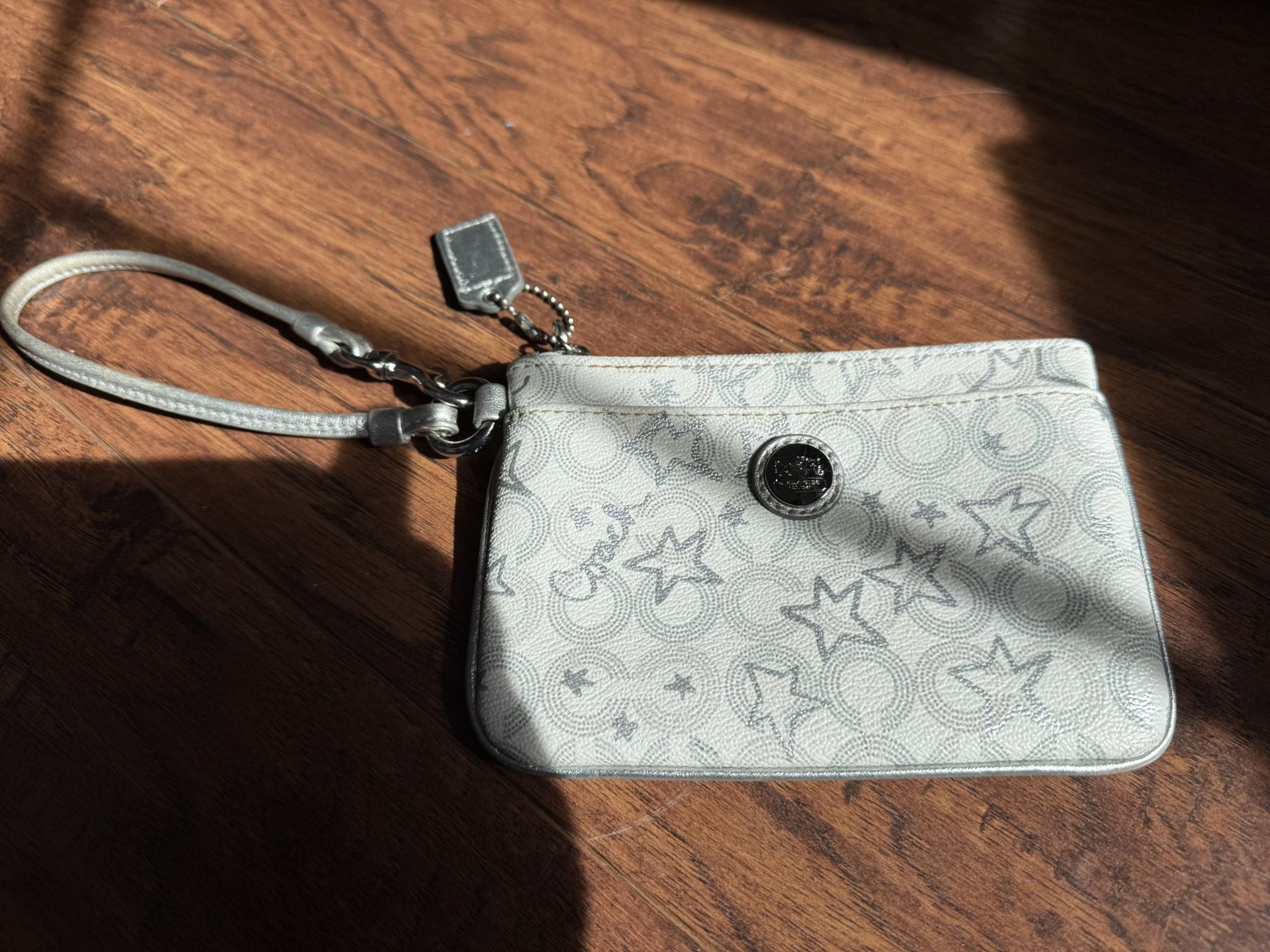 Coach Small Silver And White Star Wristlet