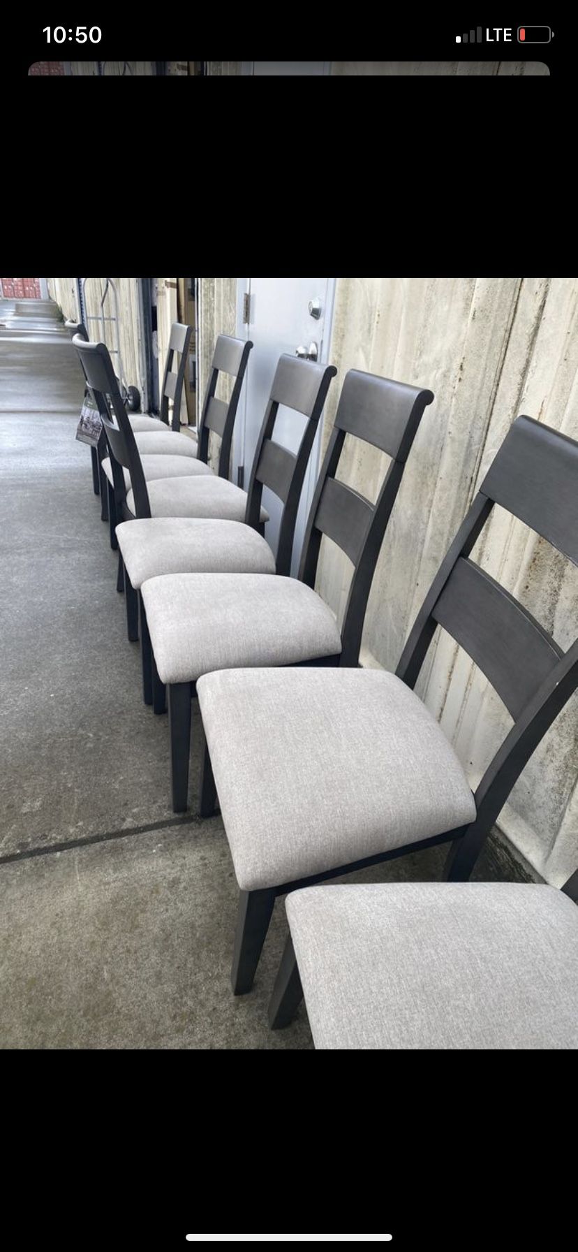 Brand new 8-piece gray Costco chairs!