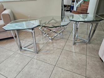 Crome & glass Tables:
Cocktail table & 2 matching end tables. Octagon shape. Very unique!
 Practical