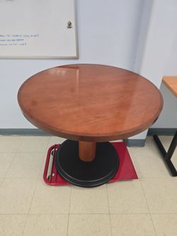 Round solid wood table