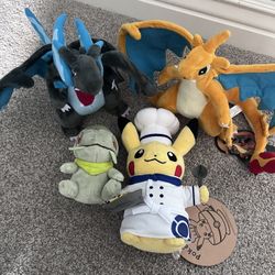 POKEMON CENTER AND CAFE ASSORTED PLUSHIES MEGA CHARIZARD X AND Y CHEF HAT PIKACHU AND AXEW