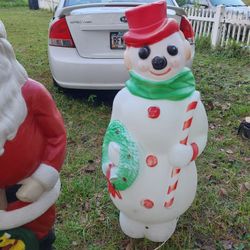 46" Snowman Blow Mold Holding Wreath and Candy Cane Stick